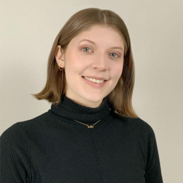 portrait image of student in black turleneck